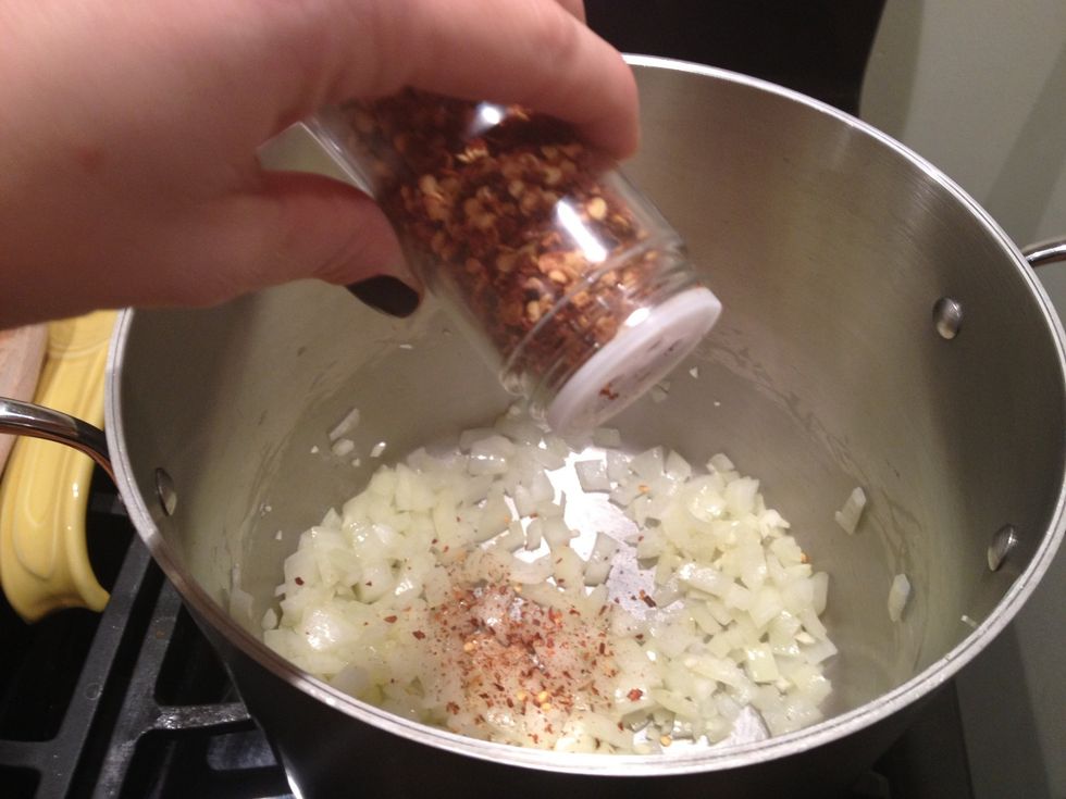 Add the garlic and the red pepper flakes.