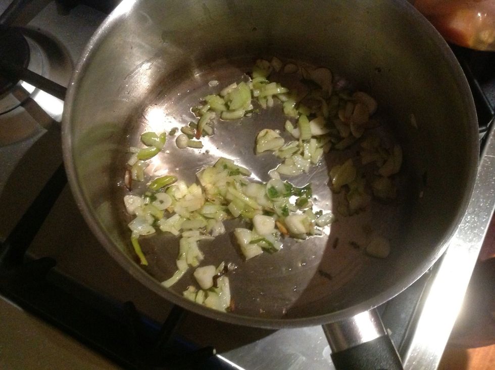 Add the garlic, curry leaves and onion, stir for a few minutes