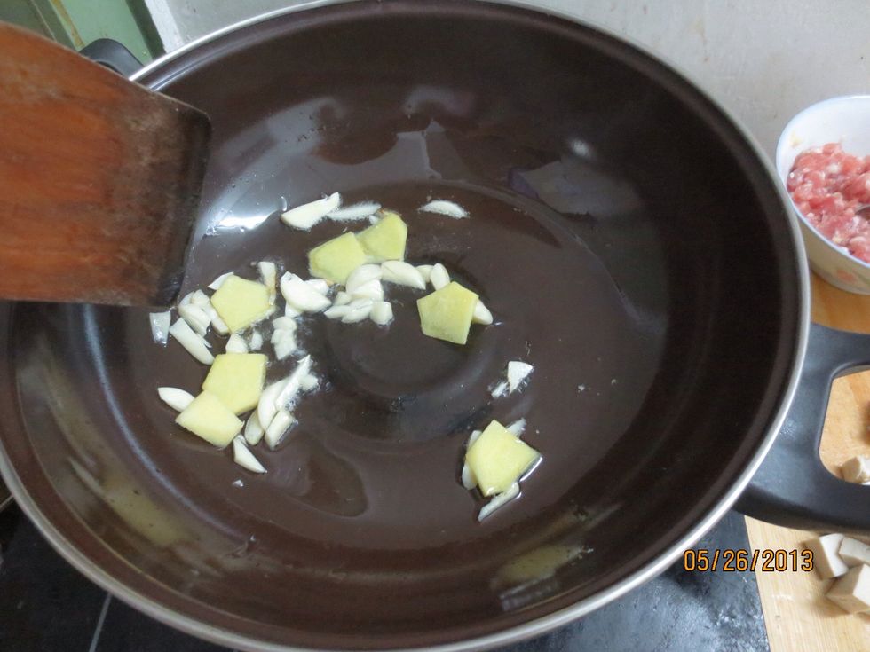 Add the garlic, ginger into hot oil