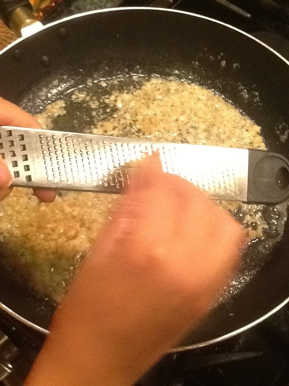 Add the garlic. I used my microplane for this step it's a time saver.
