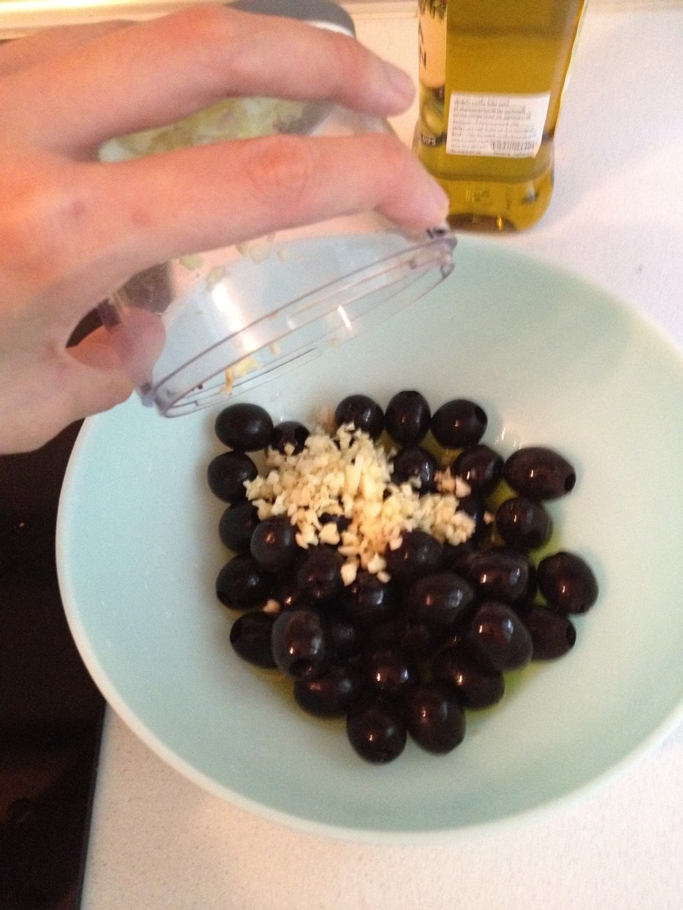 Add the garlic. In my opinion, the more the better. I only have so much left...so...