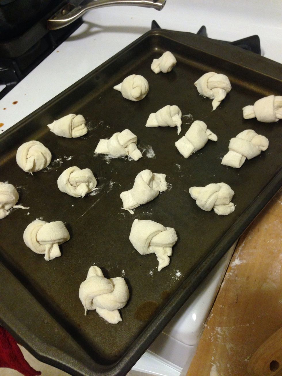 Add the garlic knots to a pan. I used nonstick spray in the pan as well.