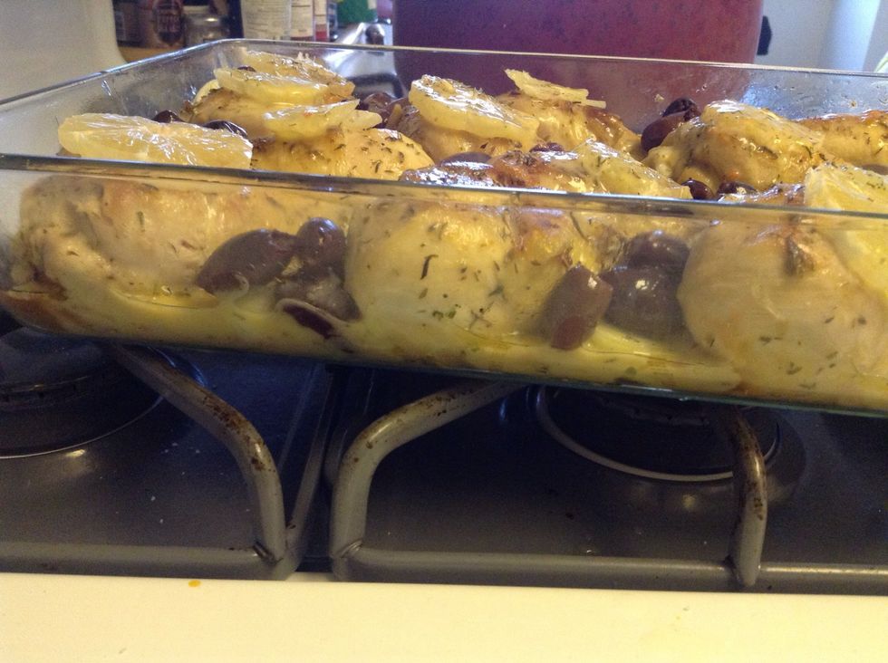 Add, the garlic, onions, olives to ur taste.. Add the reduction of lemon juice and broth on top of the drums