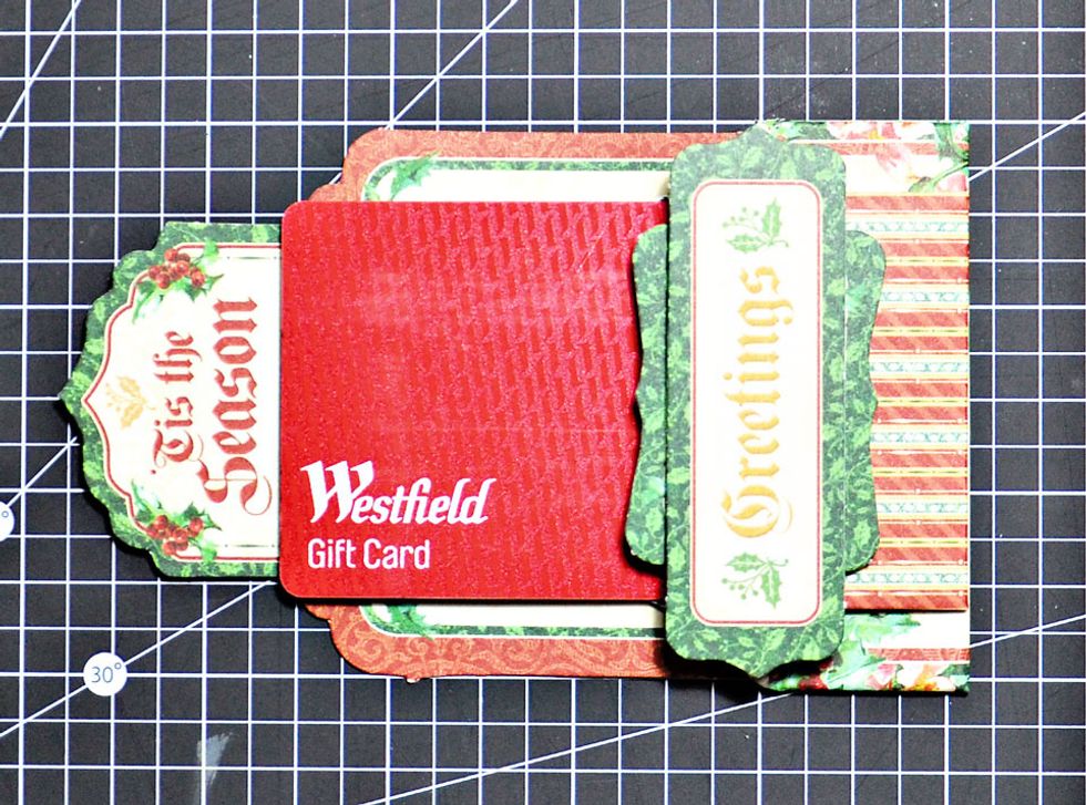 Add the gift card of your choice. Once you have finished decorating the card itself simply attach this inside.