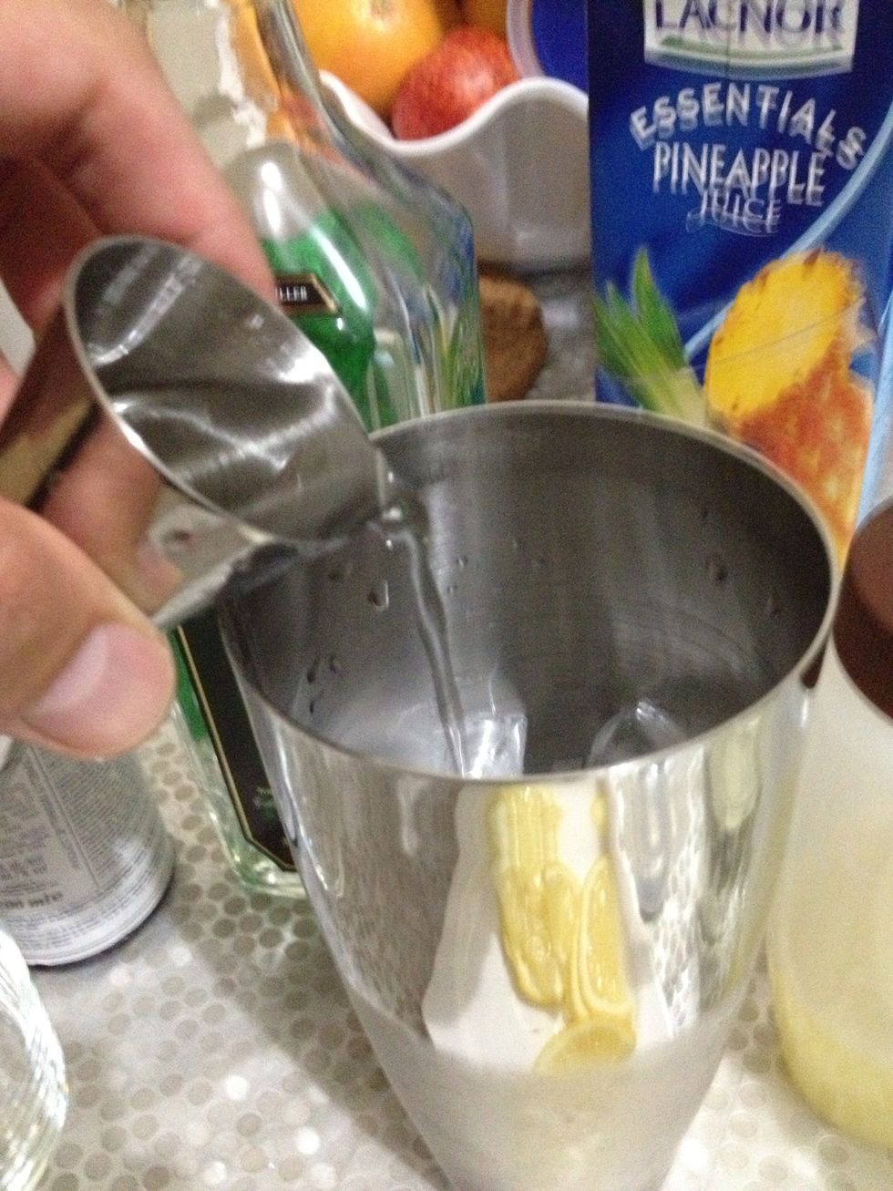 add the gin and simple syrup.