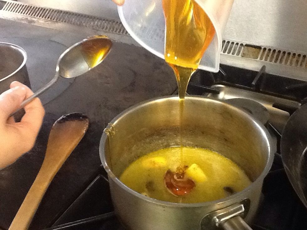 Add the golden syrup and continue to heat until the butter has completely melted