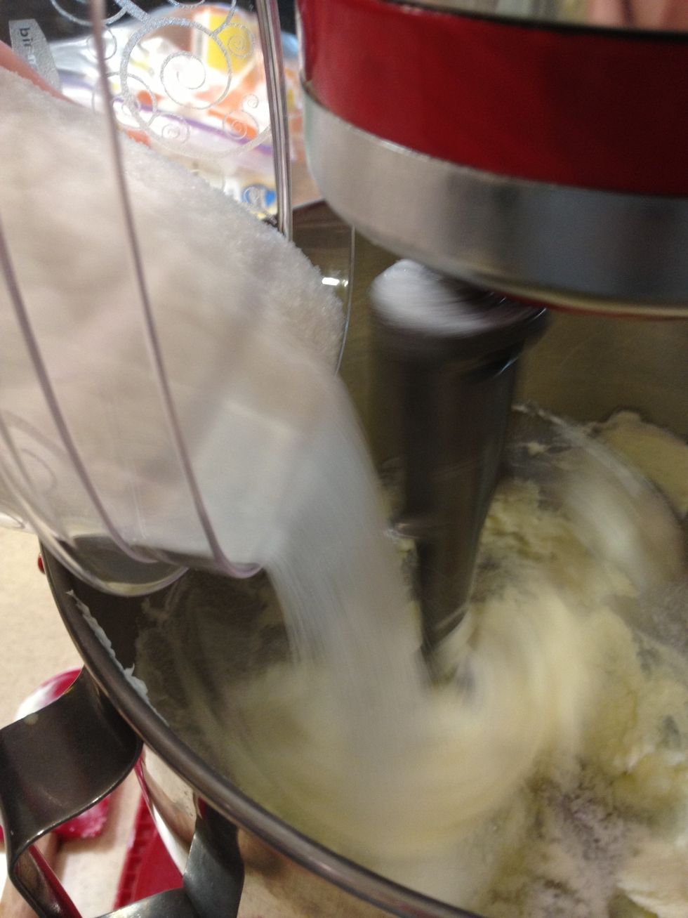 Add the granulated sugar while mixing.