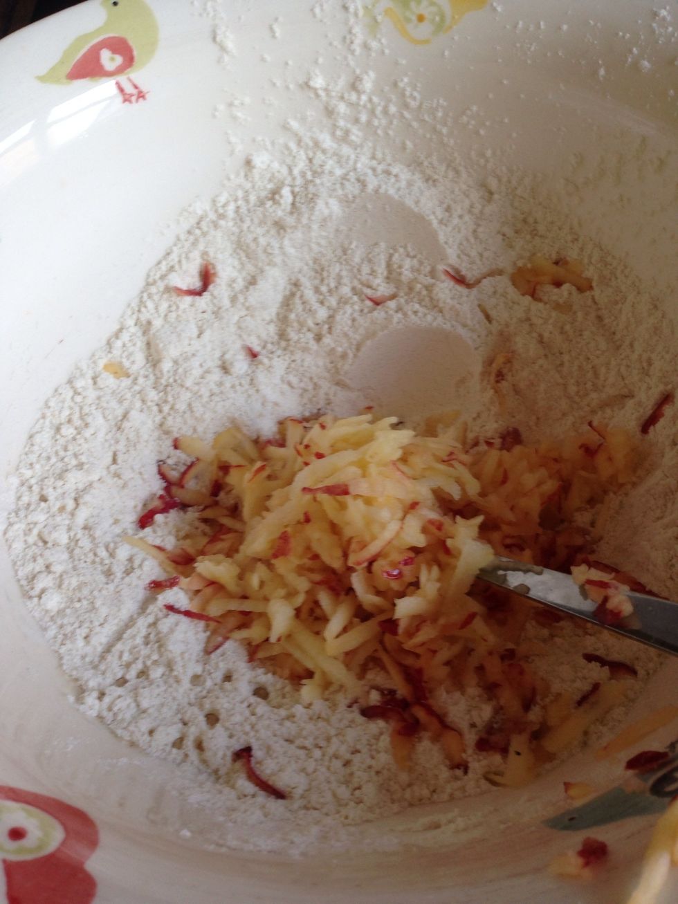 Add the grated apple and stir.