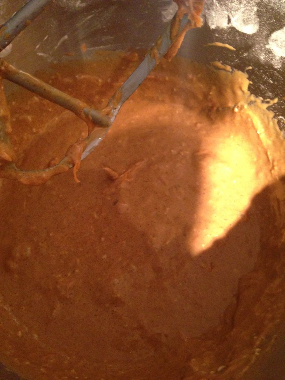 Add the grated carrot and coconut to the cake mix and mix gently for about 20 seconds till just combined.