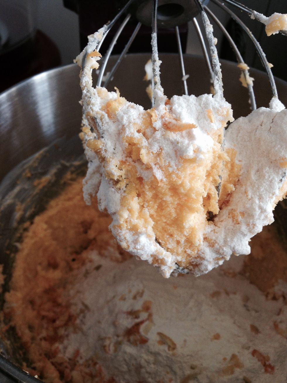 Add the grated lemon and sugar