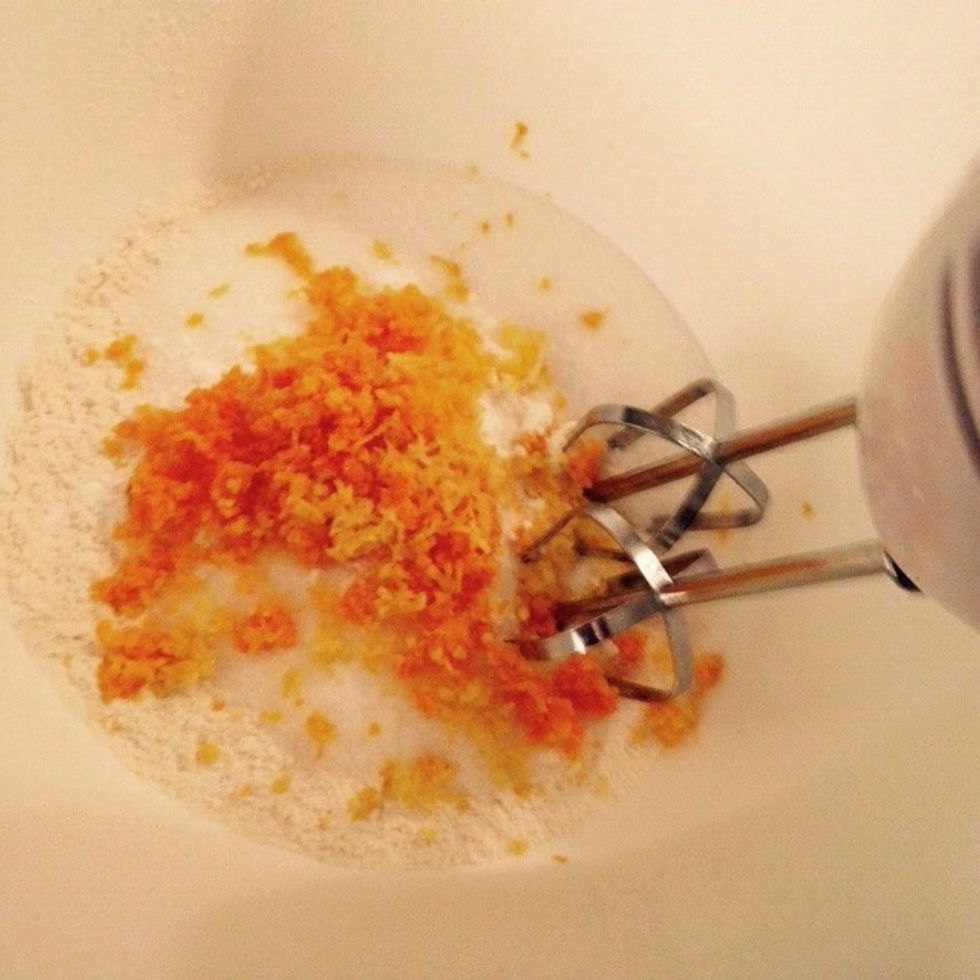 Add the grated orange and lemon peel, whisk all the ingredients together