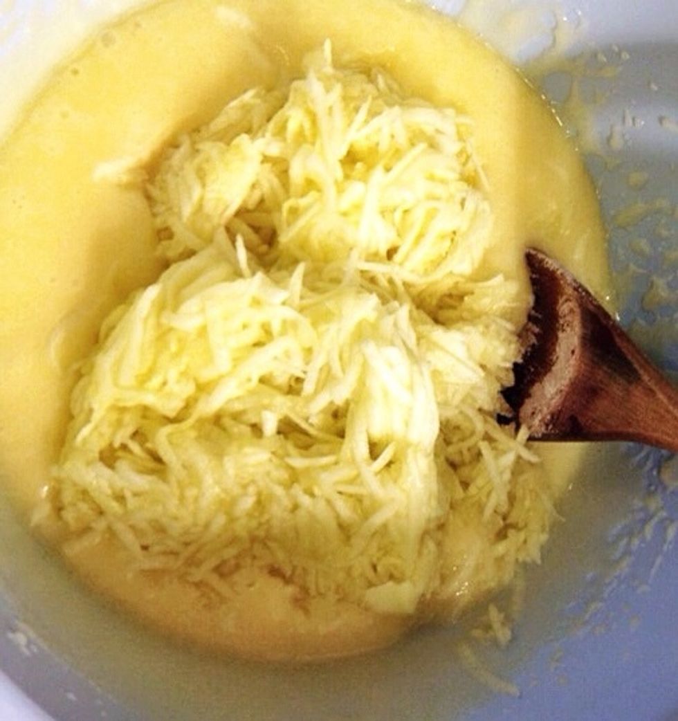 Add the grated zucchini.