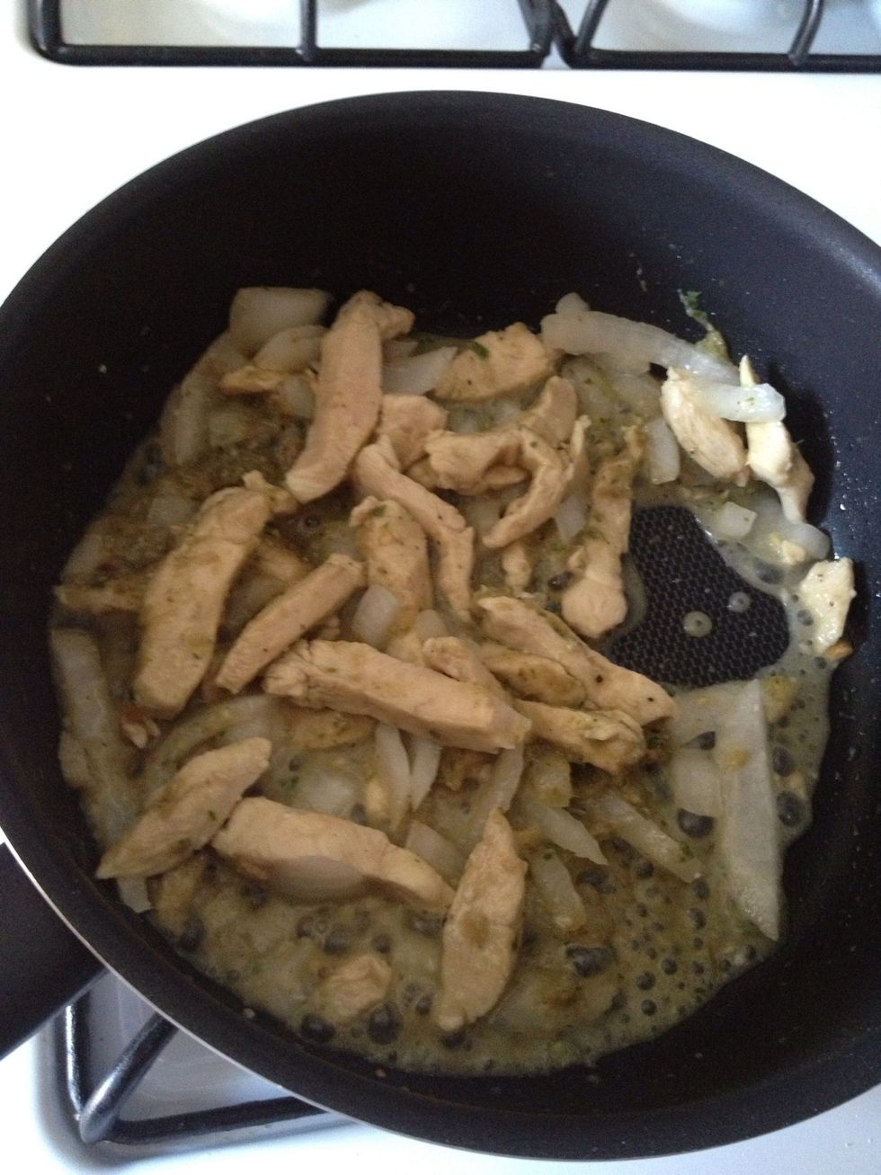 Add the green chilies paste, stir well then add the onion.