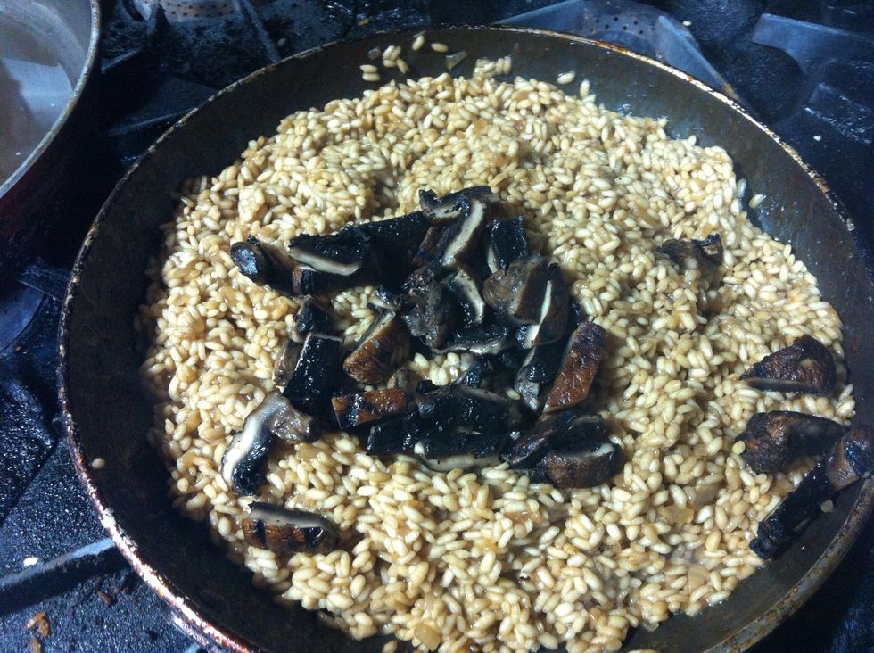 Add the grilled portobello mushrooms near the end of the cooking period.