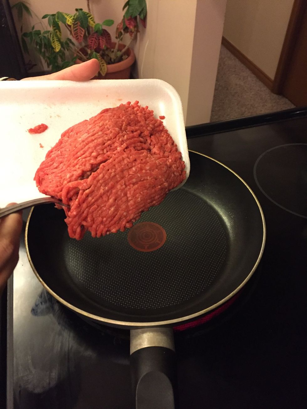 Add the ground beef to the pan.