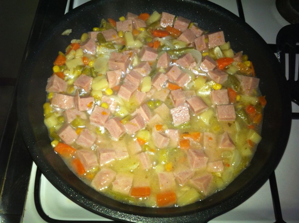 Add the half cup of water and let it simmer.