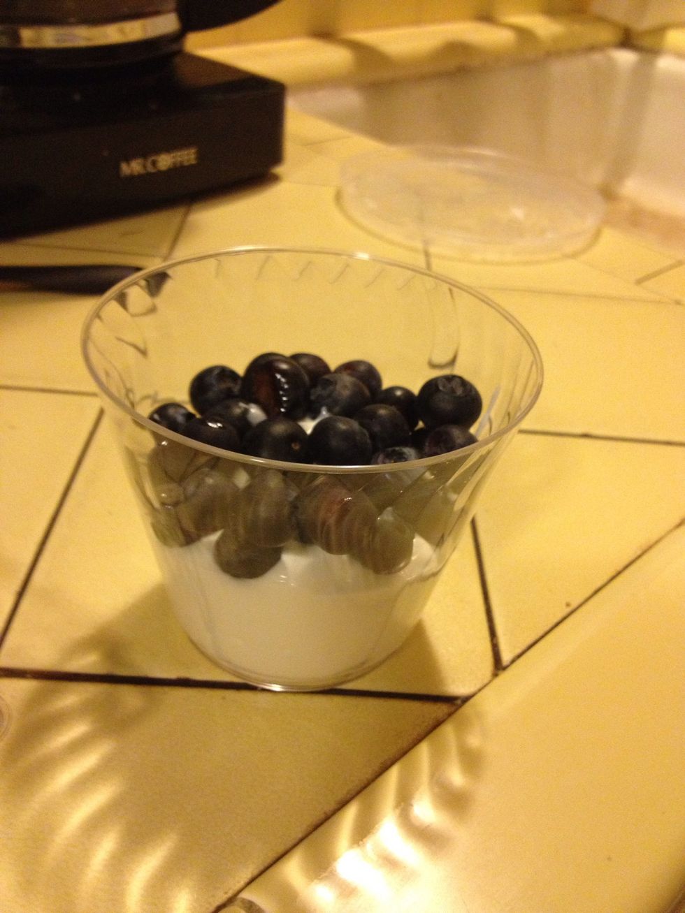 Add the handful of blueberries or berry of your choice.