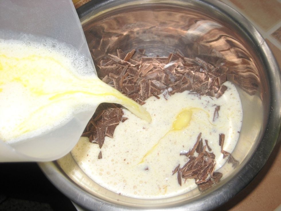 Add the hot cream to the chocolate.