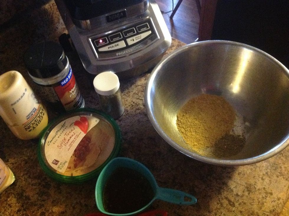 Add the hummus, Dijon and seasonings then mix with the mashed chickpeas.