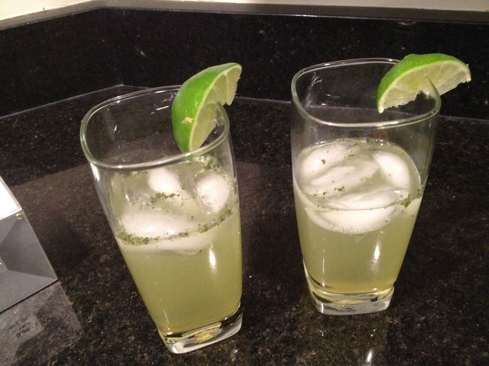 Add the ice and some lime wedges for extra pizazz! I like to rub the rim with mint for added yumminess. Enjoy!