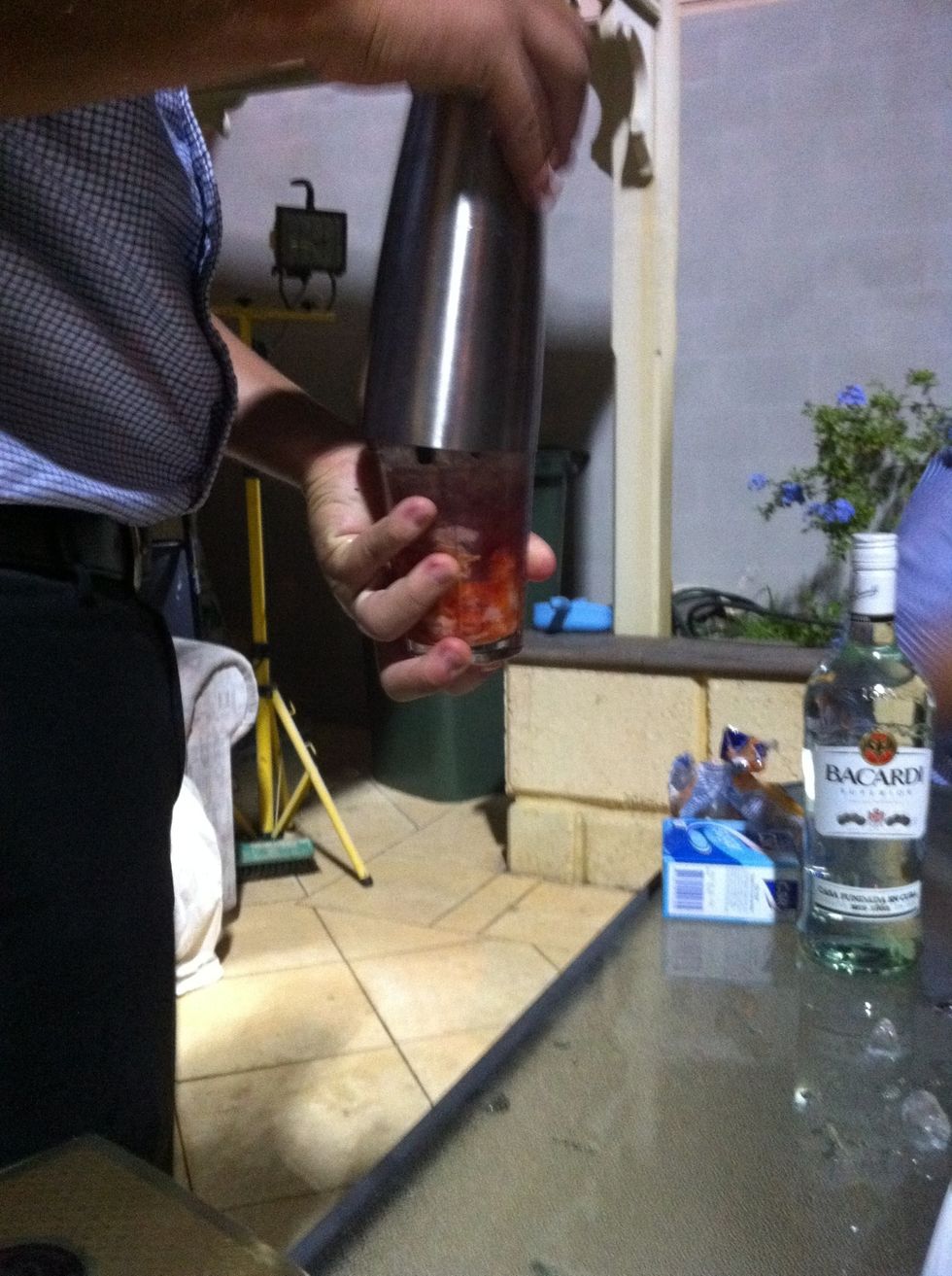 Add the ice. Pop on your shakin' lid (note one side is flush with the muddling jar).