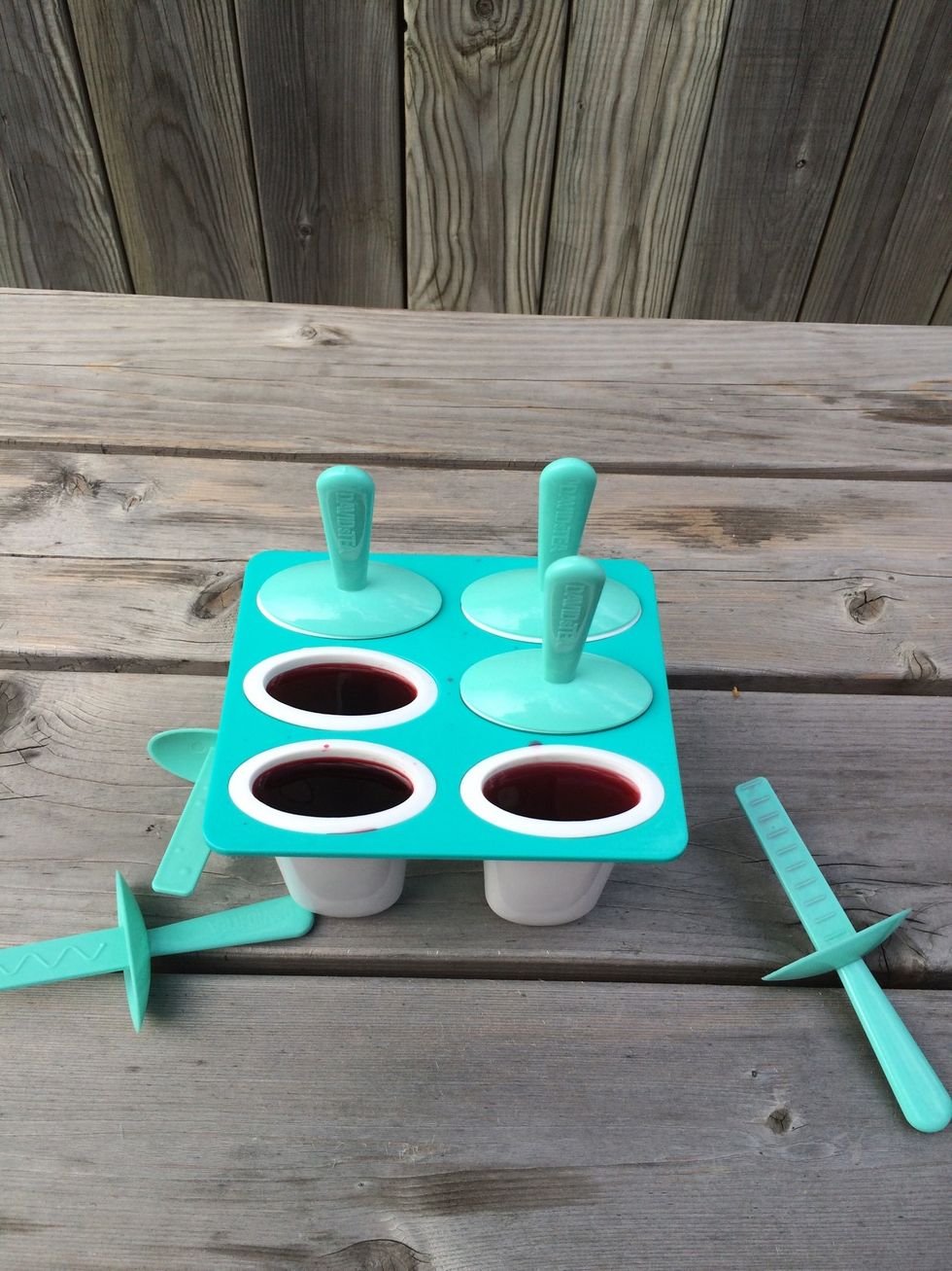 Add the ice pop sticks.