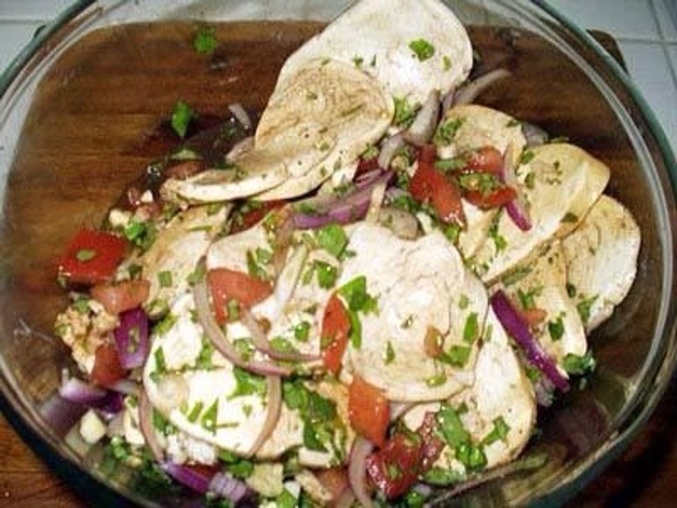 Add the ingredients to a bowl with mozz and vinegar. Add black pepper. Stir until everything is covered, making sure not to tear up the mozzarella.