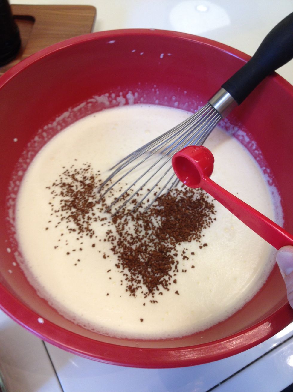 Add the instant coffee. (Maybe you need to move over to a bowl for space considerations.)