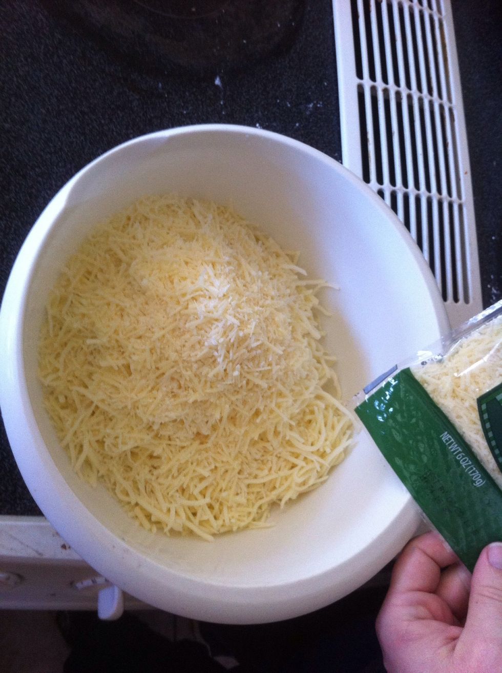 Add the Italian cheese to a bowl, add approximately 4oz of Parmessan cheese \u27a1