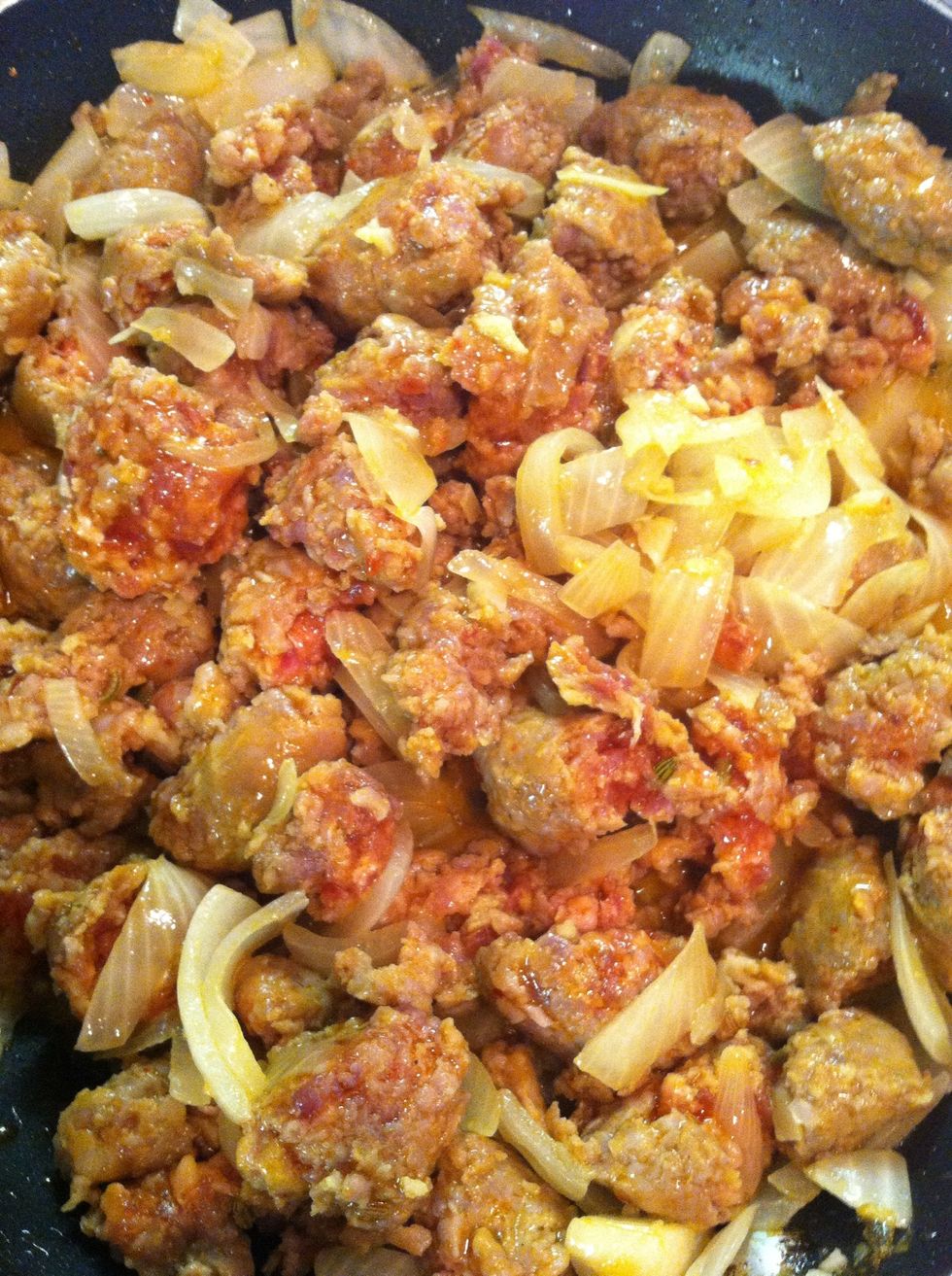 Add the Italian sausage to the onions, cook and stir for 15 minutes...