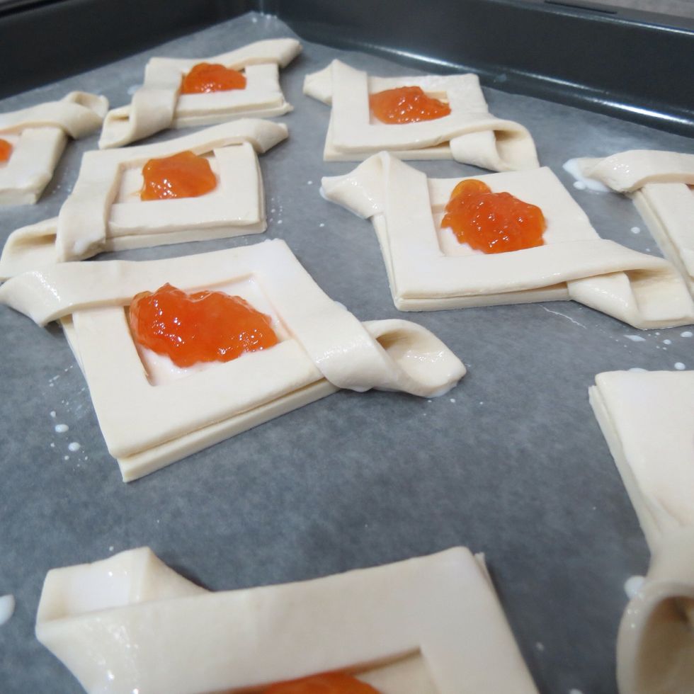 Add the jam .i used peach jam you can use any flavour .(you can add any topping that you like such as cheese ...etc ).