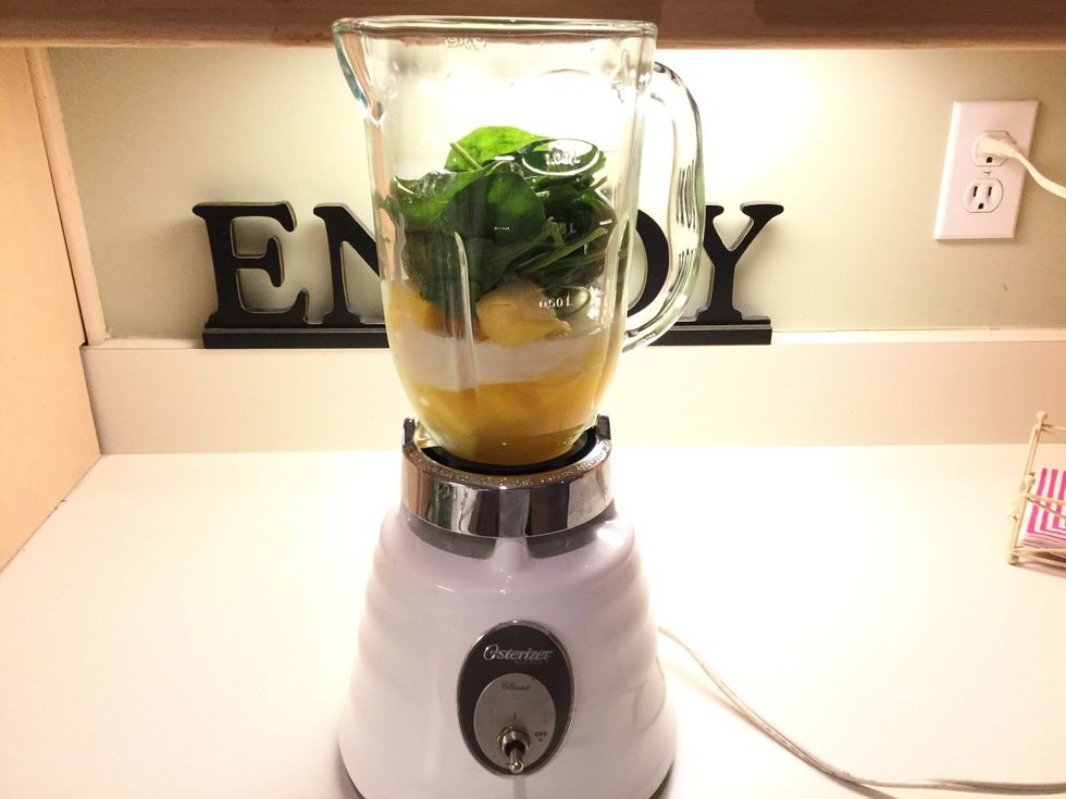 Add the juice and almond milk into the blender