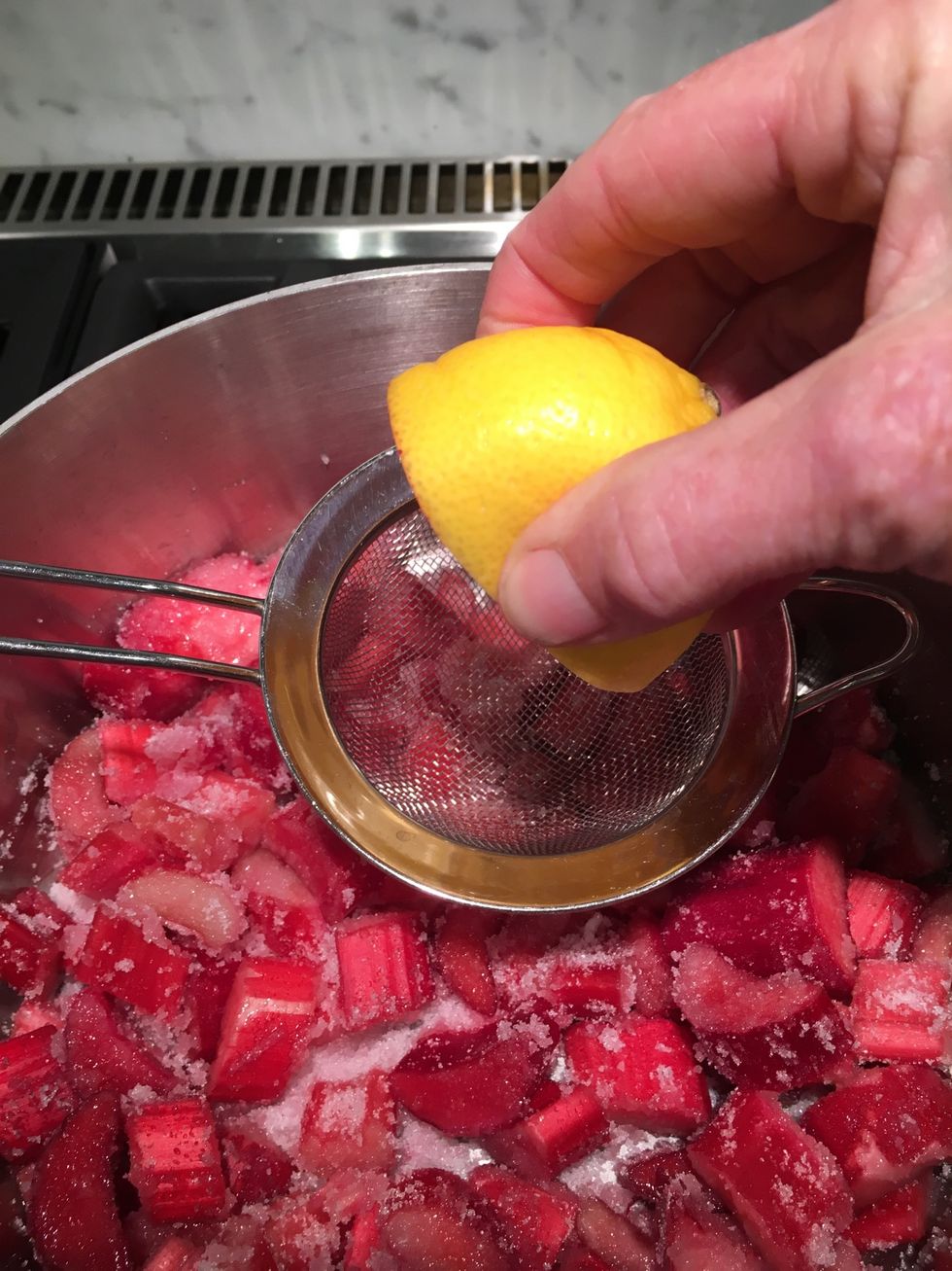 Add the juice of half a lemon. Don't squirt any on your new marble kitchen or you'll be sorry.