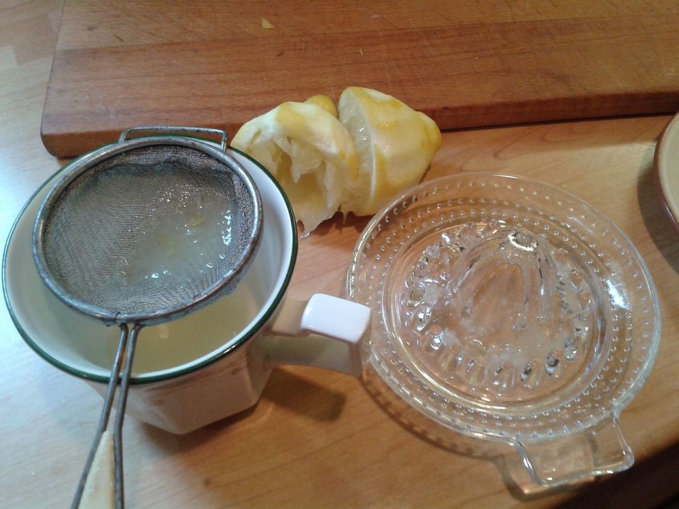 Add the juice of the lemon, I squeeze through a tea strainer, it isn't a lot of fun trying to find that evasive pip.