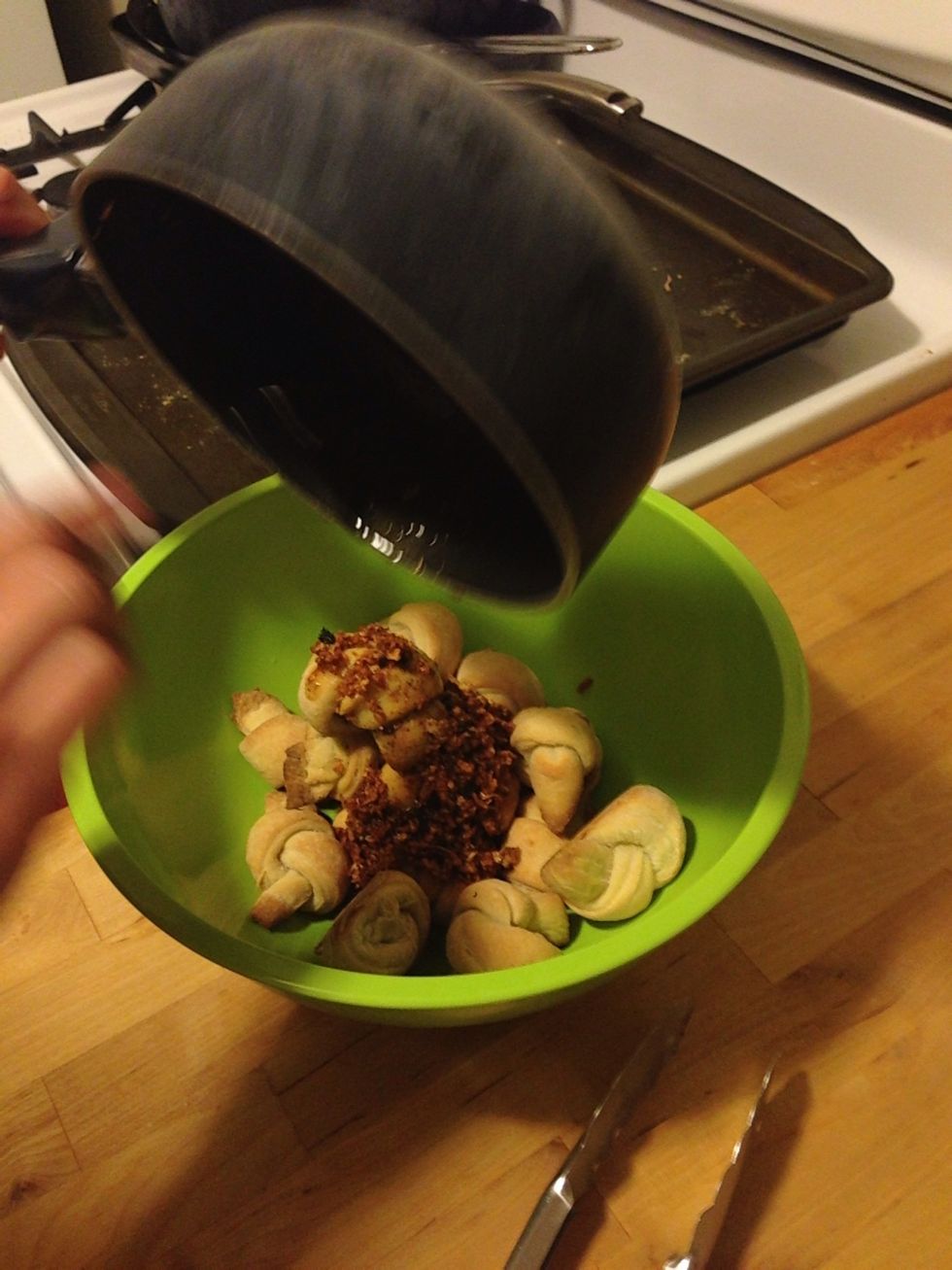 Add the knots to a large bowl and add the sauce mixture to the bowl.