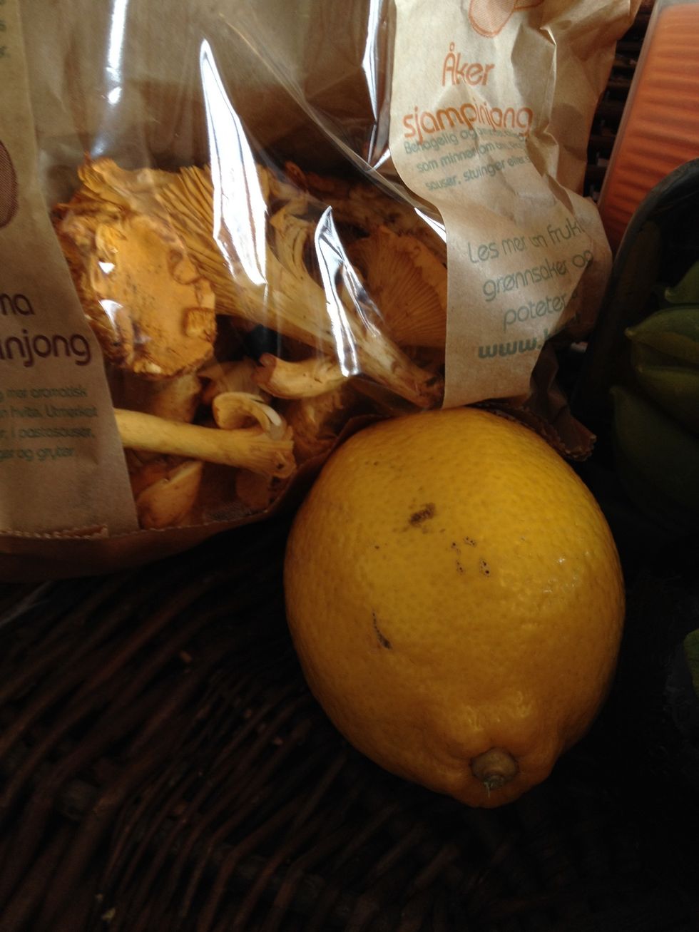 Add the lemon and the mushrooms.