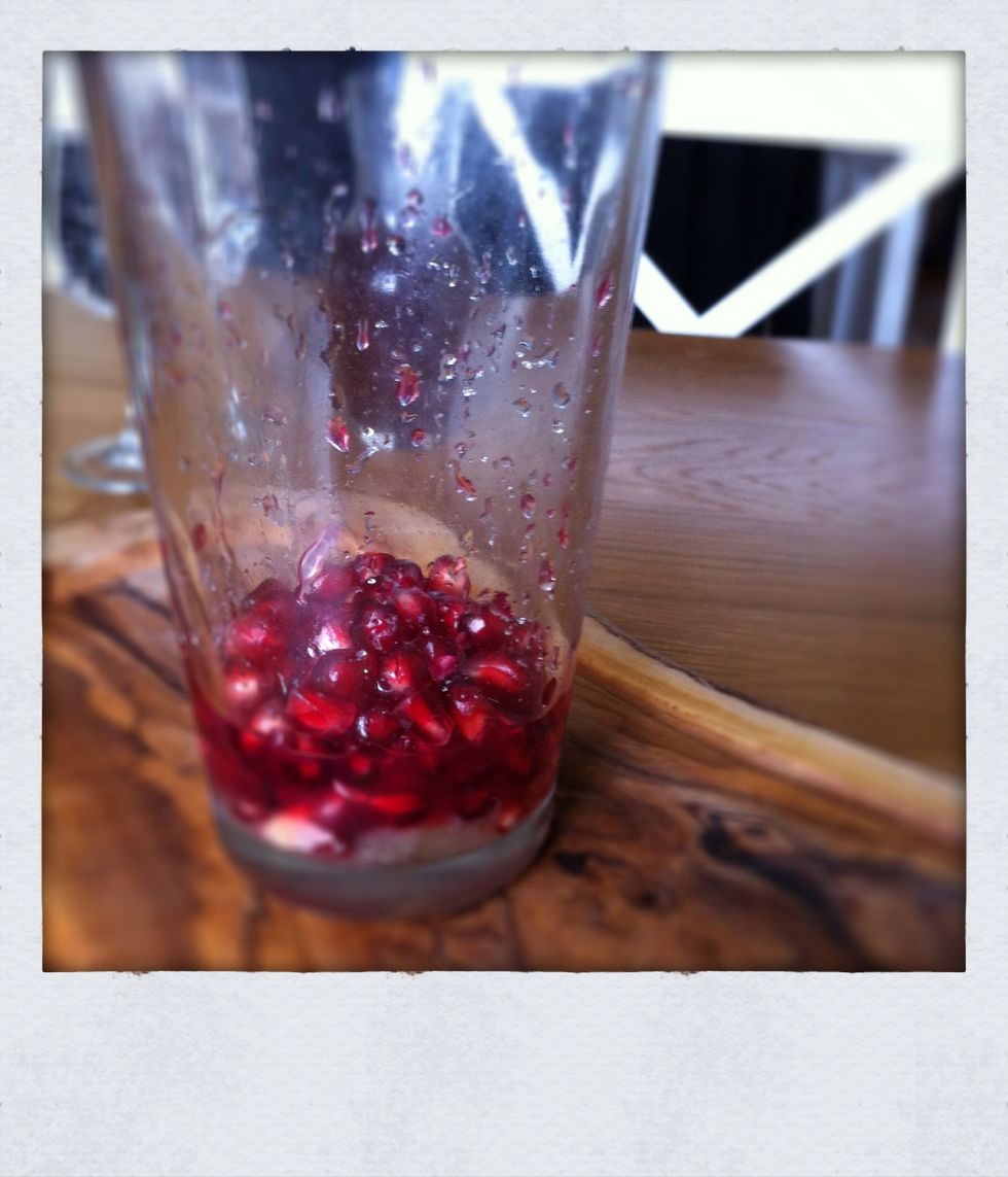 Add the lemon juice, sugar and pomegranate seeds to your mixing glass. If you have a Muddle use it to squash the seeds and release the juice. Now add the tea, some ice and shake hard.