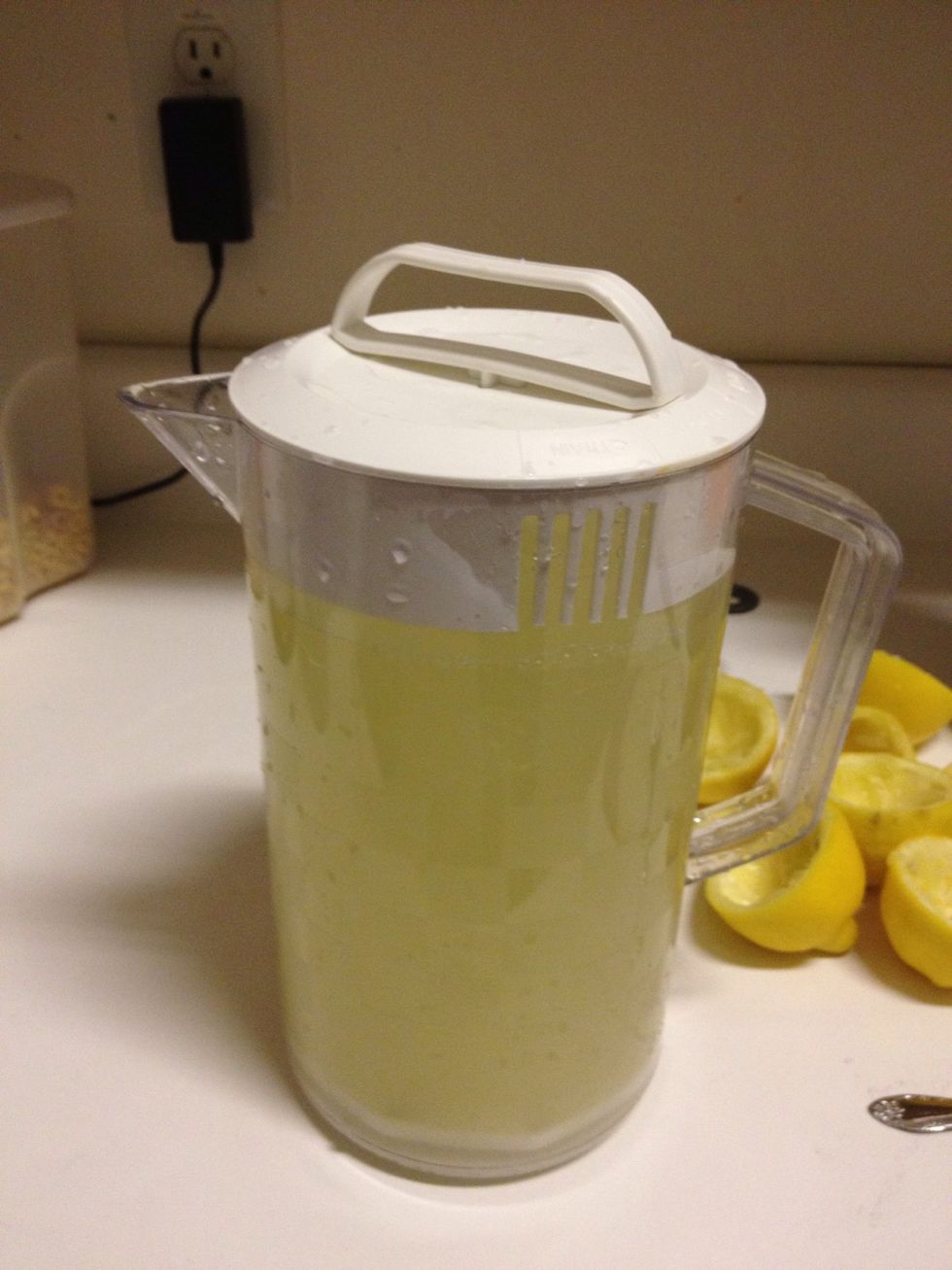 Add the lemon juice, sugar, and water together. Stir. Some people add the pulp from juicing the lemons to it. Too sour for me, but your mileage may vary. Add more sugar if you like it sweet.