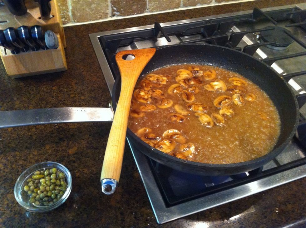 Add the lemon juice, then the chicken stock and reduce. Finally, add the capers