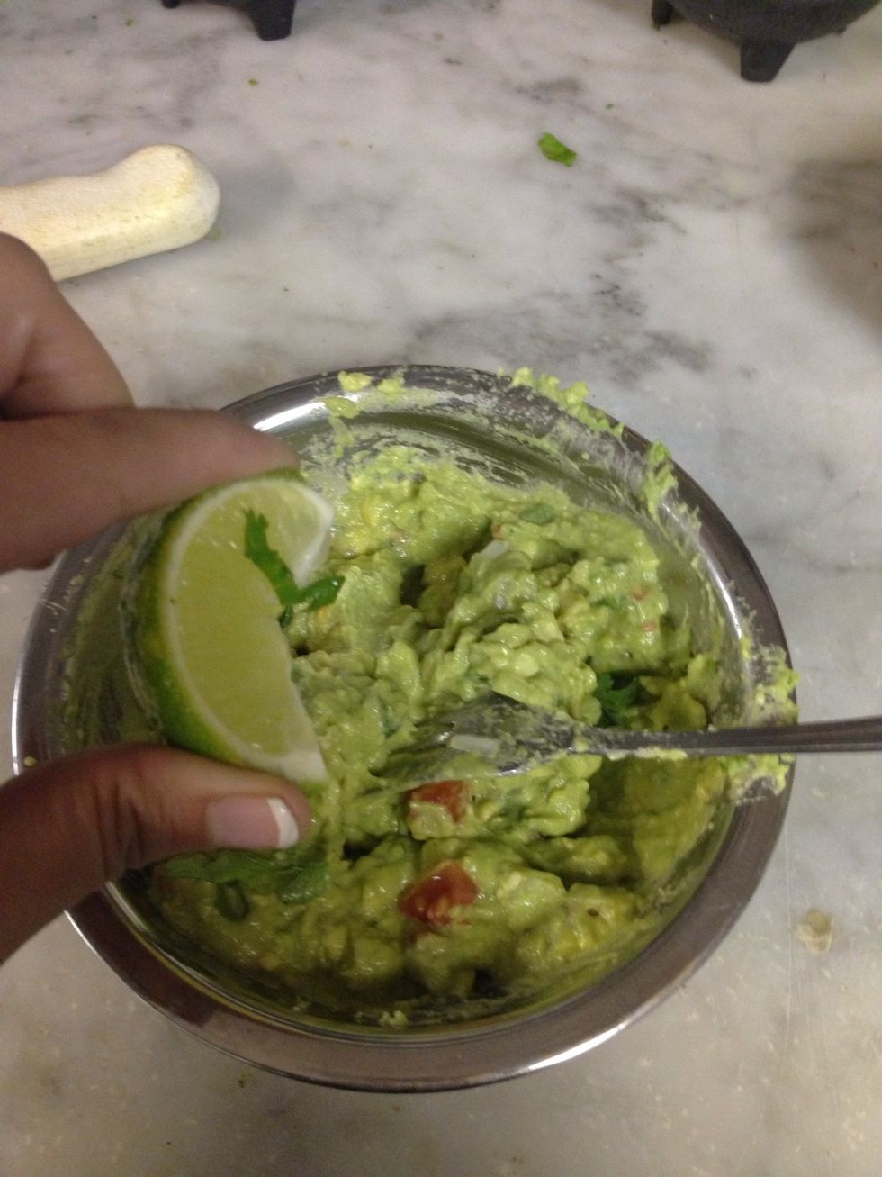 Add the lime and the salt, i use a hole lime but you can add half and then try it. Just remember that the secret to a good guacamole is the lime and salt.