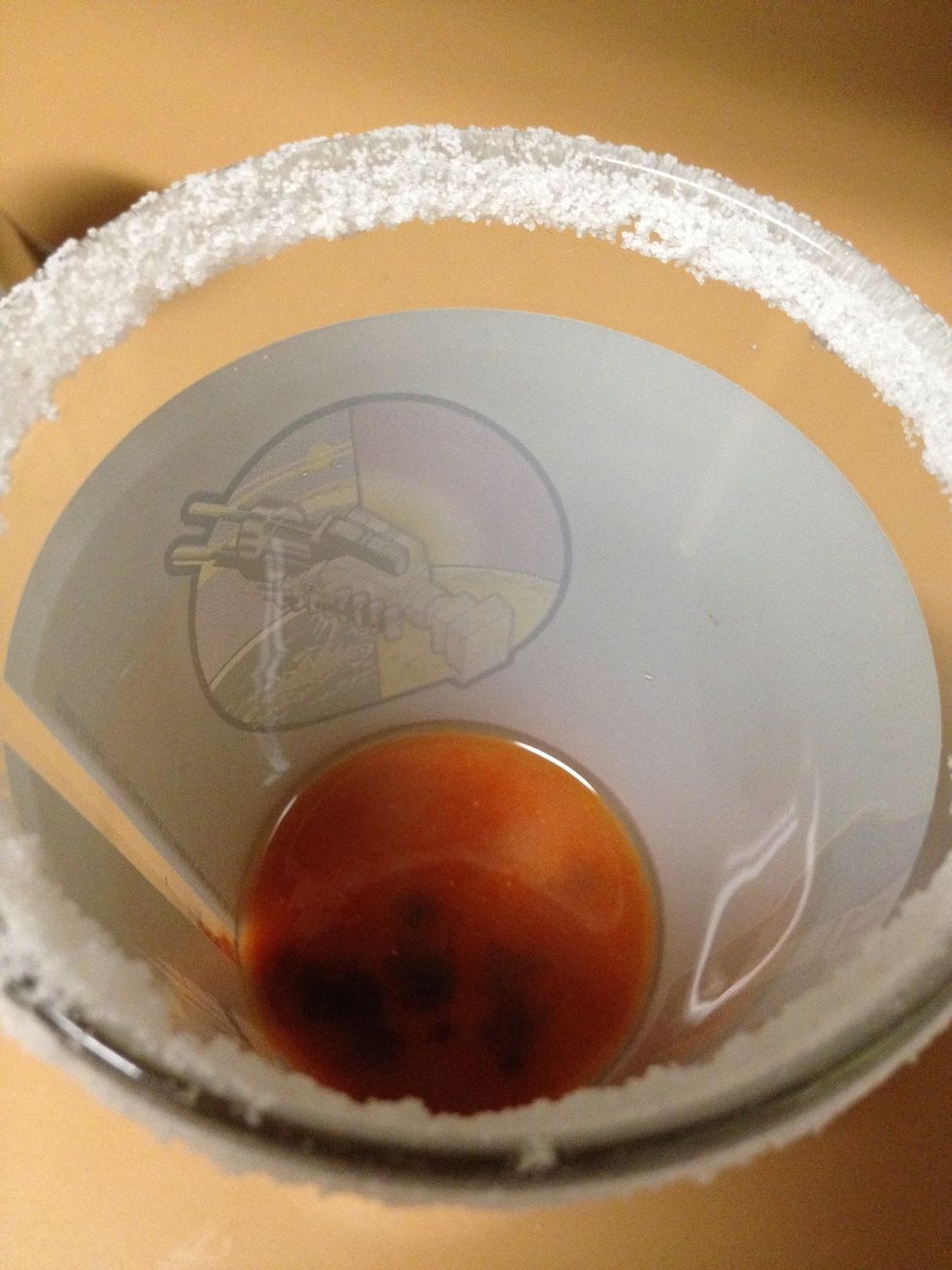 Add the lime juice, sriracha and Maggi seasoning to your cup.