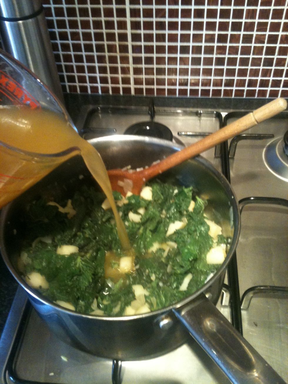 Add the litre of boiling water with the stock cubes dissolved into it.