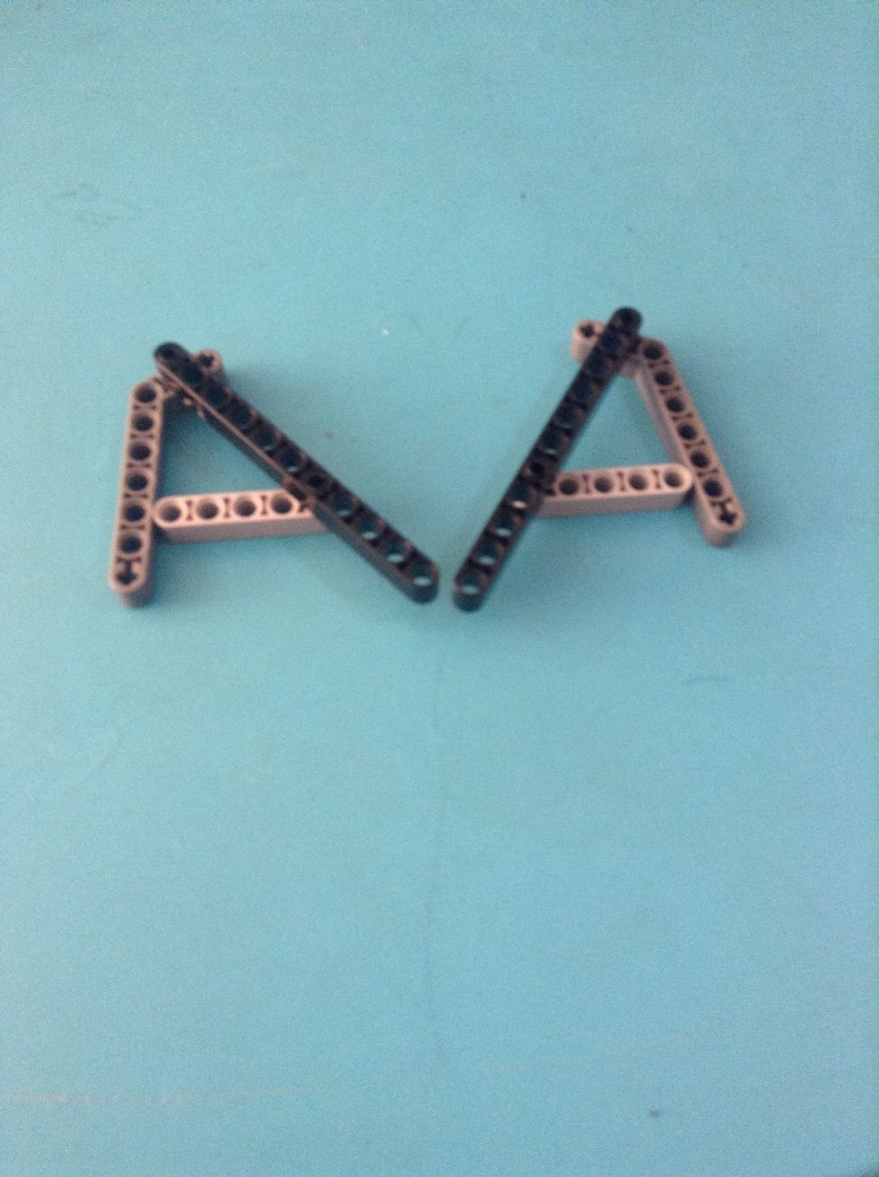 Add the little grey pieces in the bottom of the supports