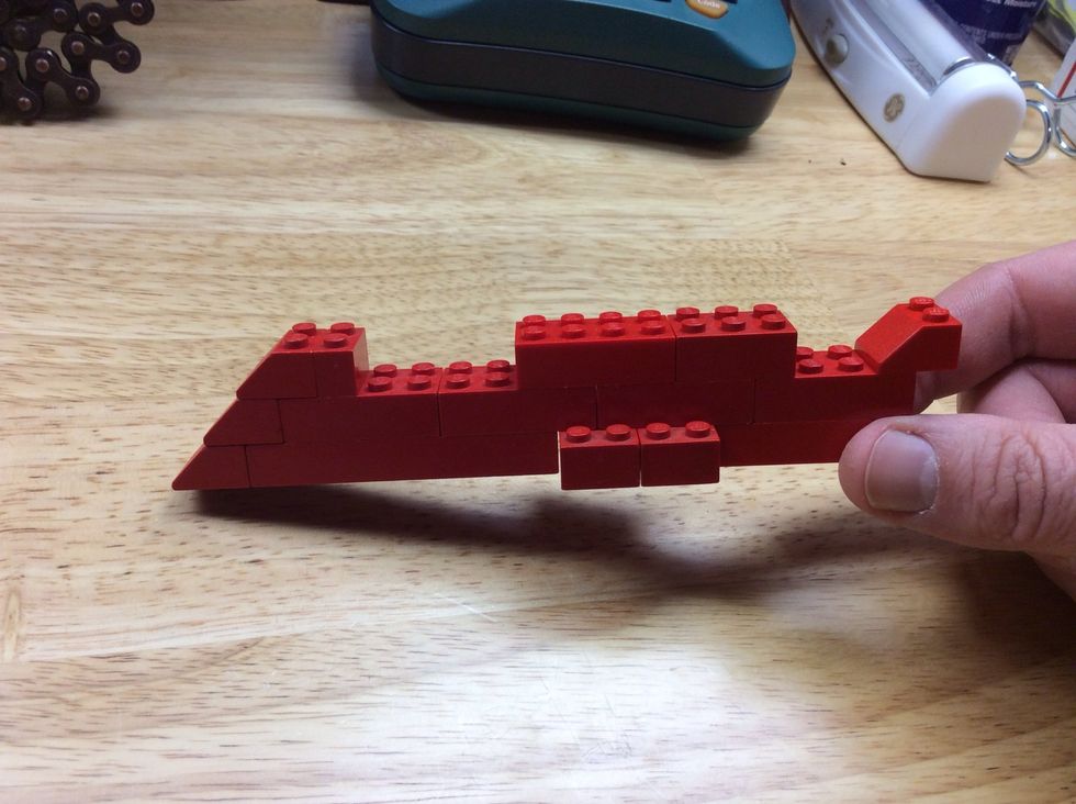 Add the little pieces to the second row of bricks.