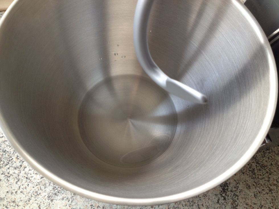 Add the lukewarm water to a bowl