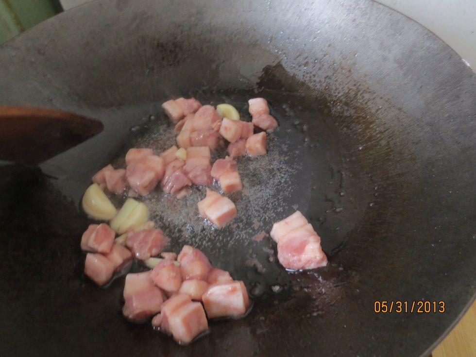 Add the marinated pork, stirfry on medium heat