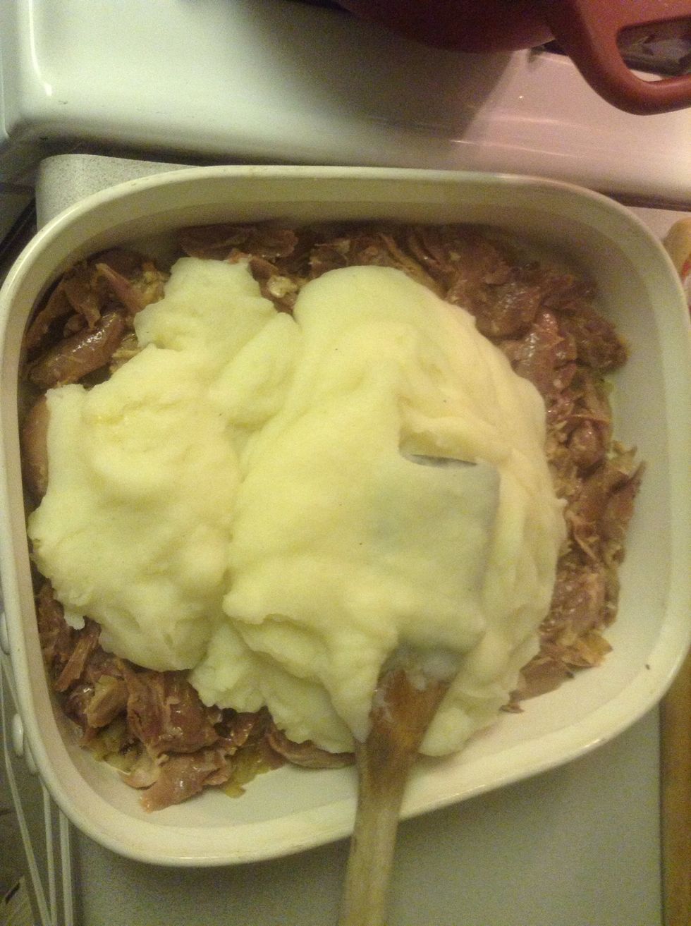 Add the mash potatoes on top of the duck