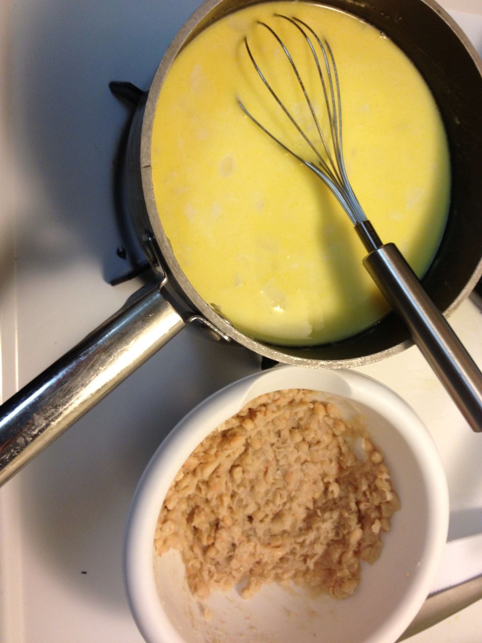 Add the mashed beans to the sauce.