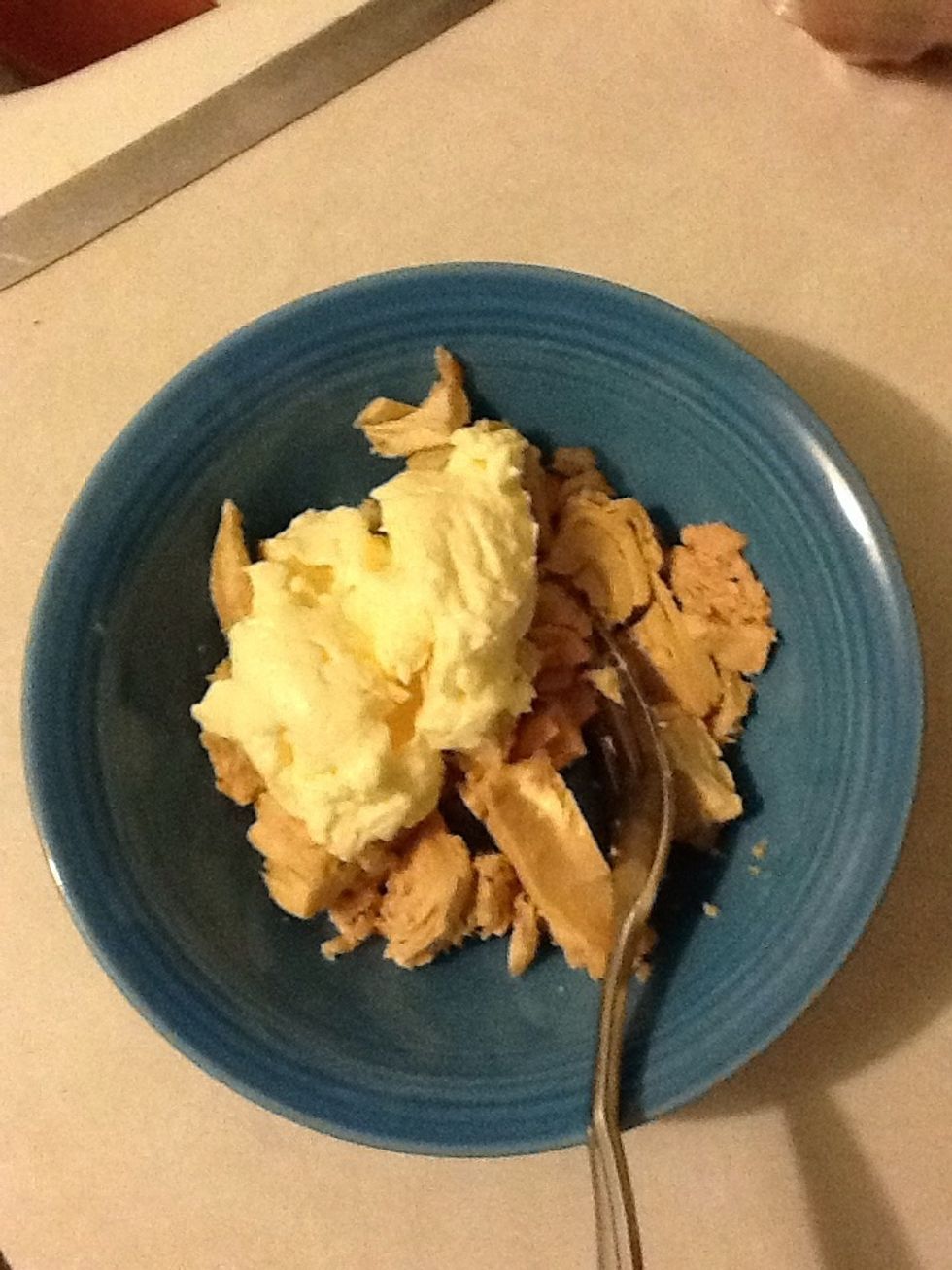 Add the mayonnaise. Some people like it dry while others prefer a more creamy consistency. Add the amount you desire.