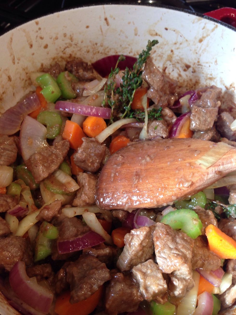 Add the meat and thyme to the pan